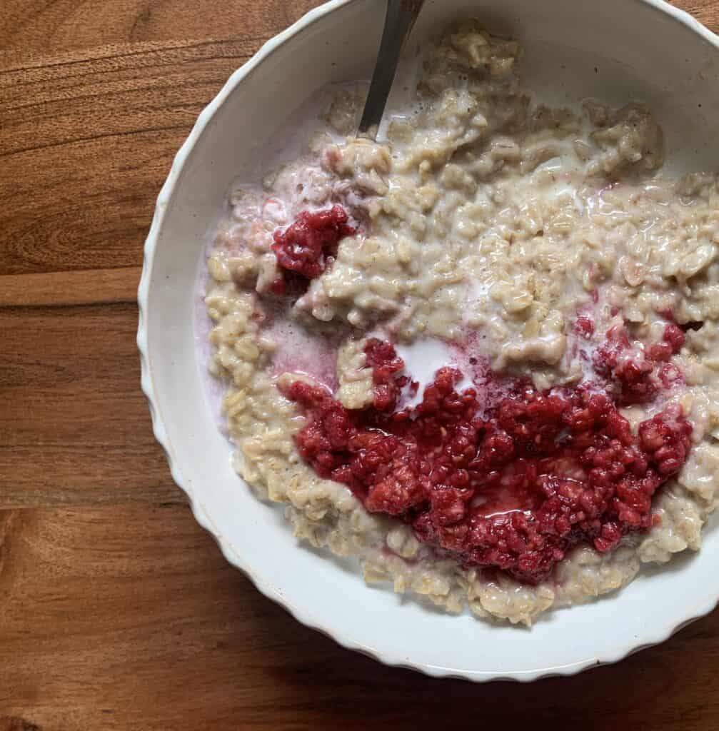 Oatmeal postpartum porridge with raspberries